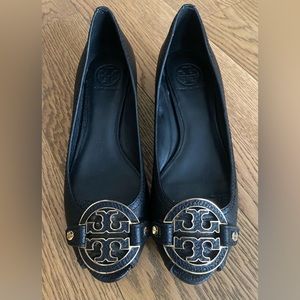 Tory Burch black leather wedges size 8.5. Excellent condition.